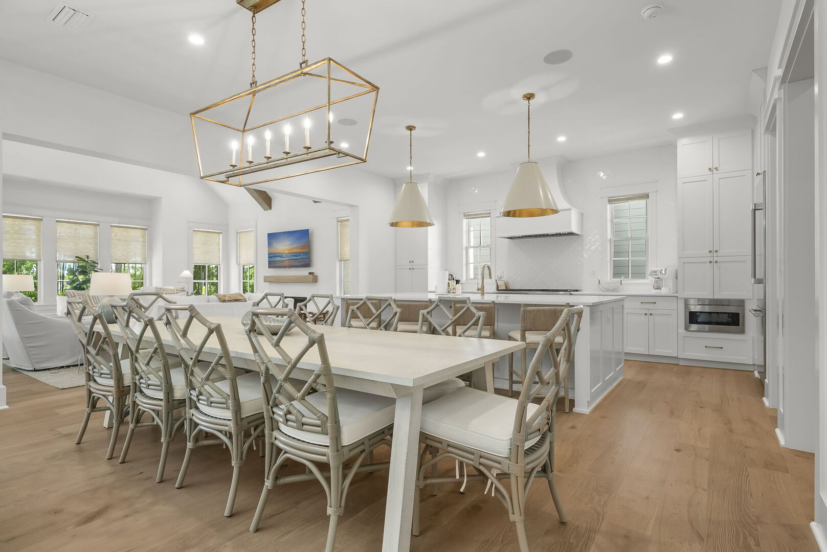 Dining room table features seating for 10. Kitchen island includes seating for an additional 4.
