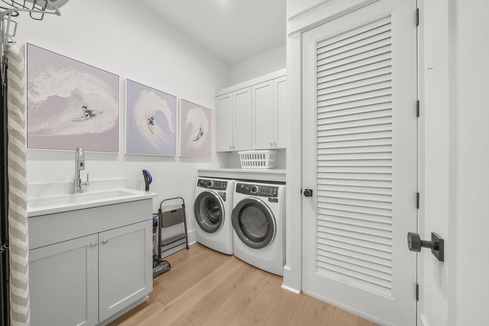 First floor features a large laundry room with full sized washer and dryer.