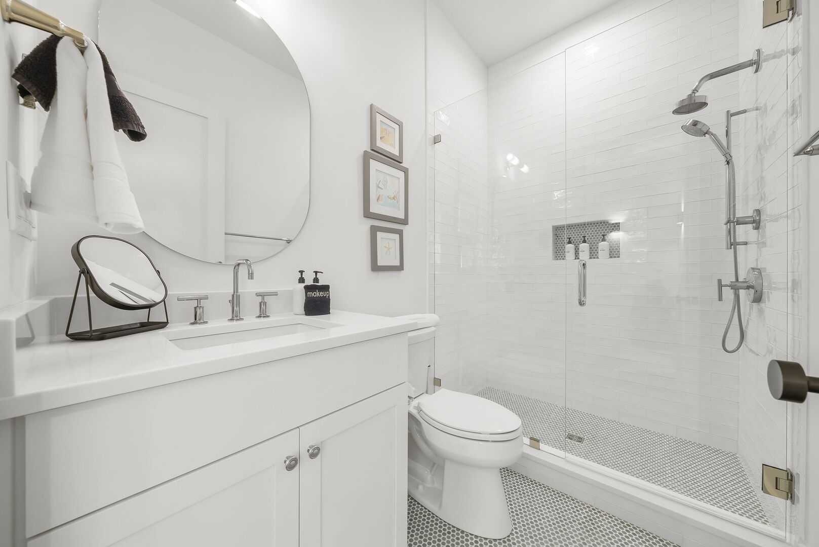 Second floor hall bathroom features a walk-in shower.