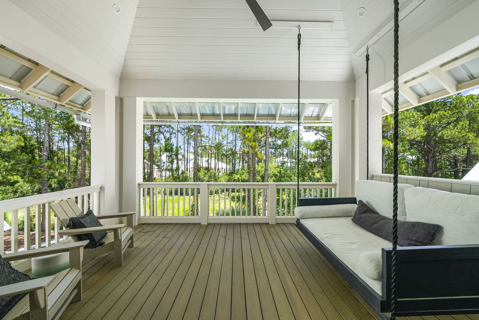 Balcony off bedroom overlooks pool and Tresca Lake. Enjoy the tranquil setting with your morning cup of coffee!