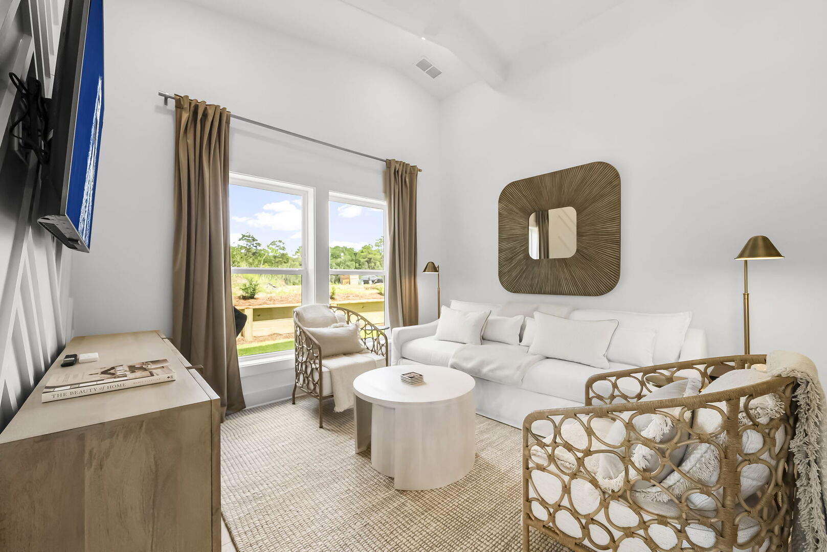 Living room has a smart TV that is perfect for watching movies!