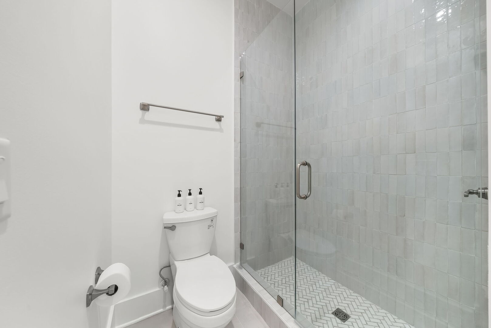 Bathroom includes a walk-in shower.