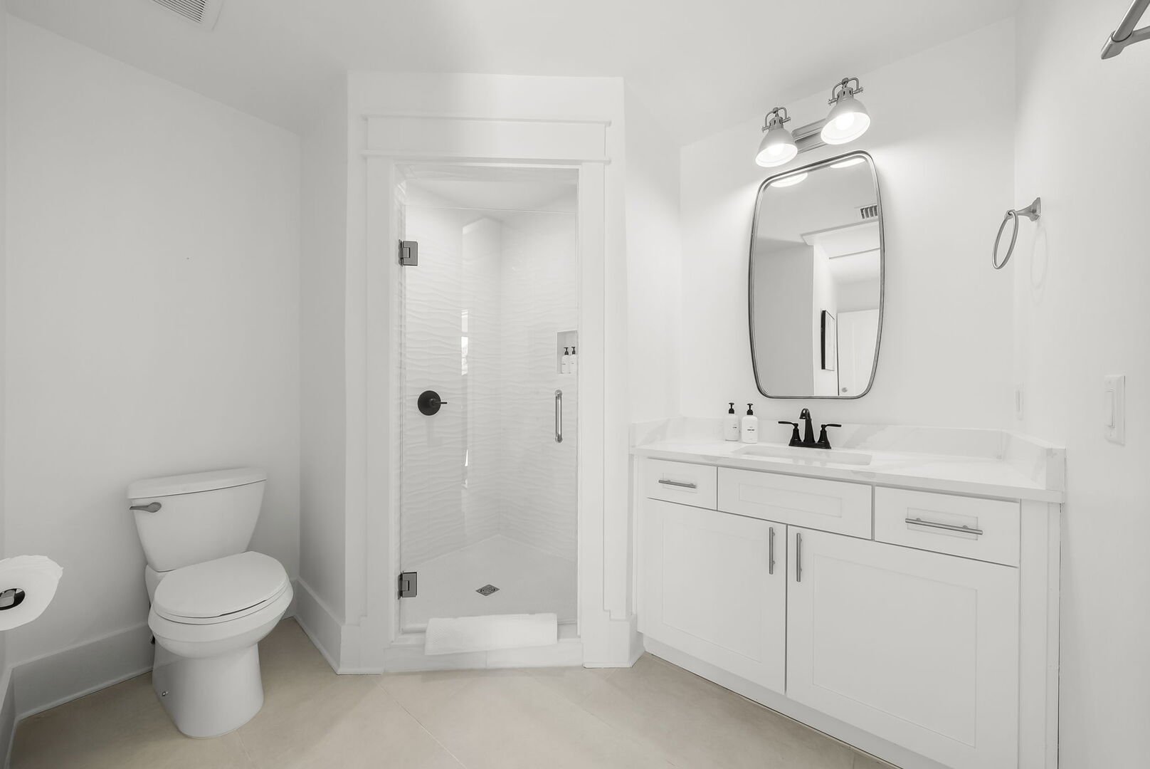 Pool house shared walk-in shower.