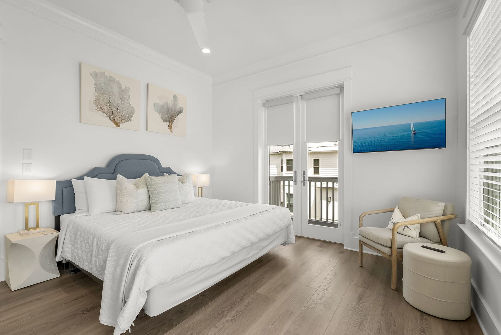 Bedroom #4 features a king bed, smart tv, access to balcony, and ensuite.