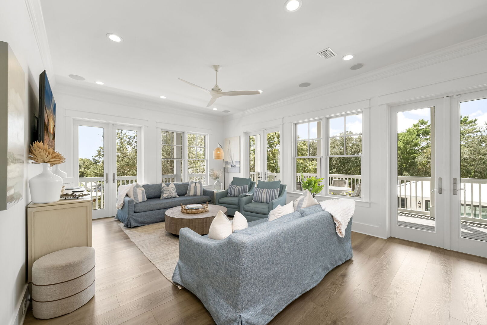 Living room features plenty of seating with a smart tv, perfect for entertaining.