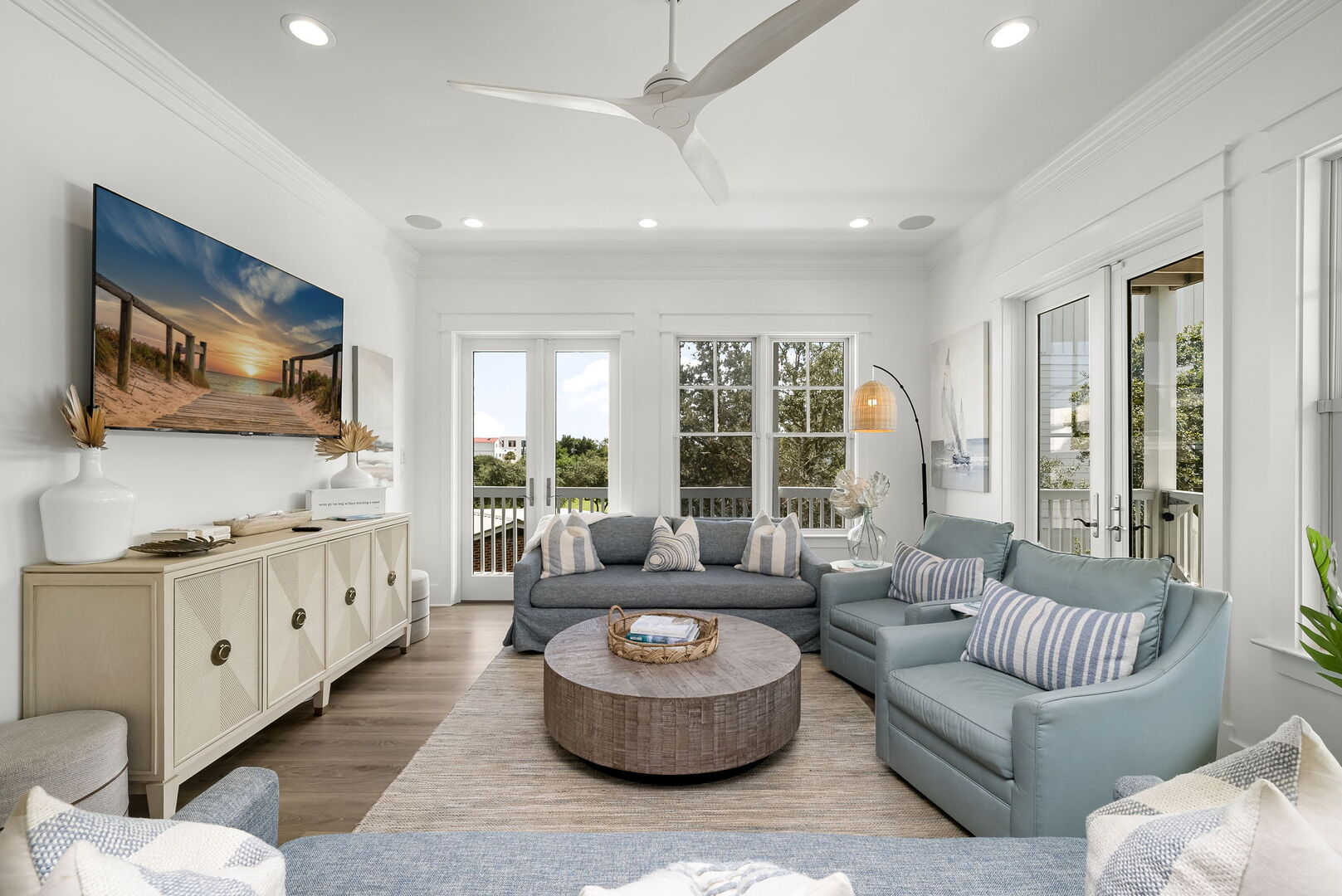 Living room features plenty of seating with a smart tv, perfect for entertaining.