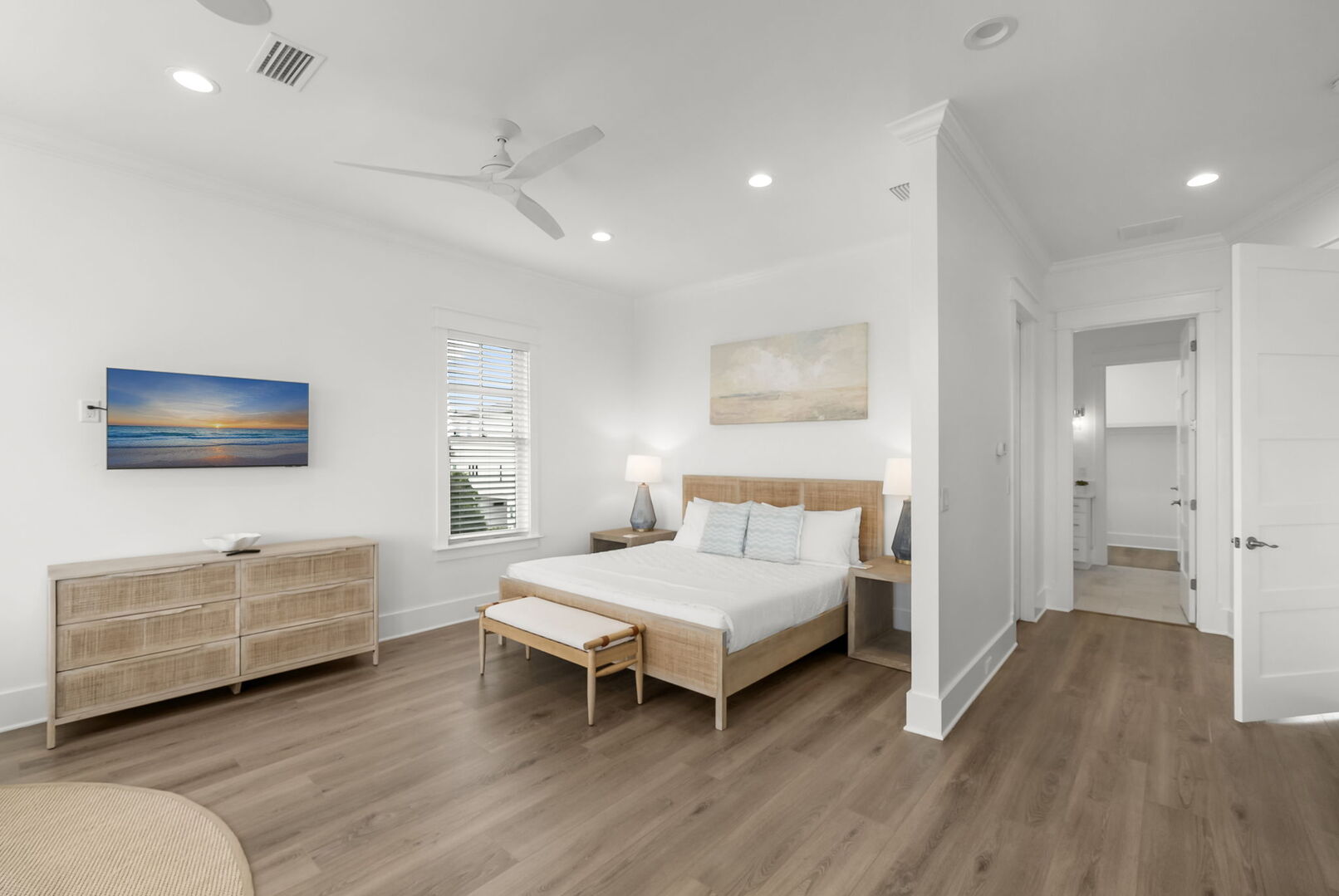 Bedroom #5 features a king bed, smart tv, access to balcony, and ensuite.