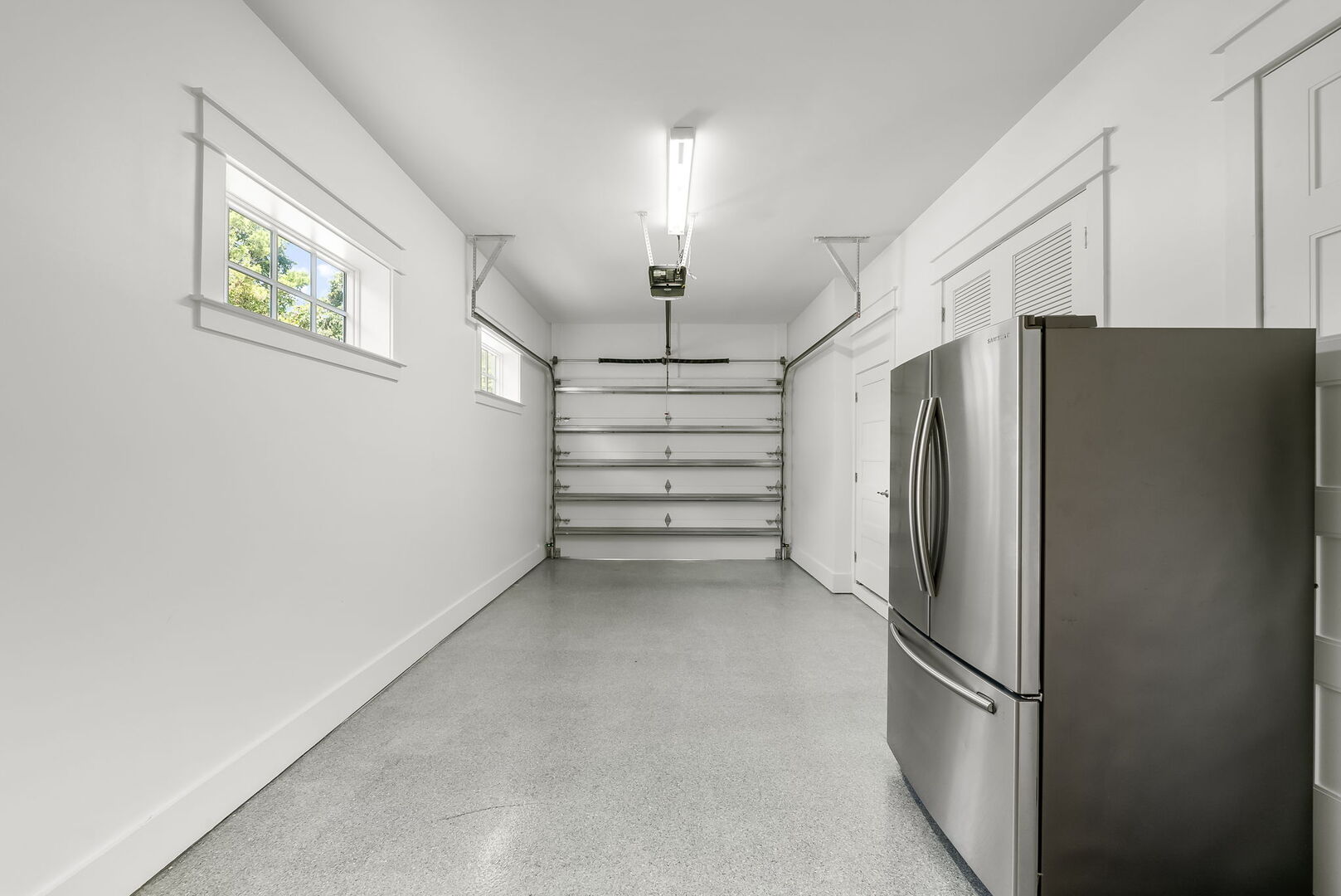 Garage access with additional fridge.