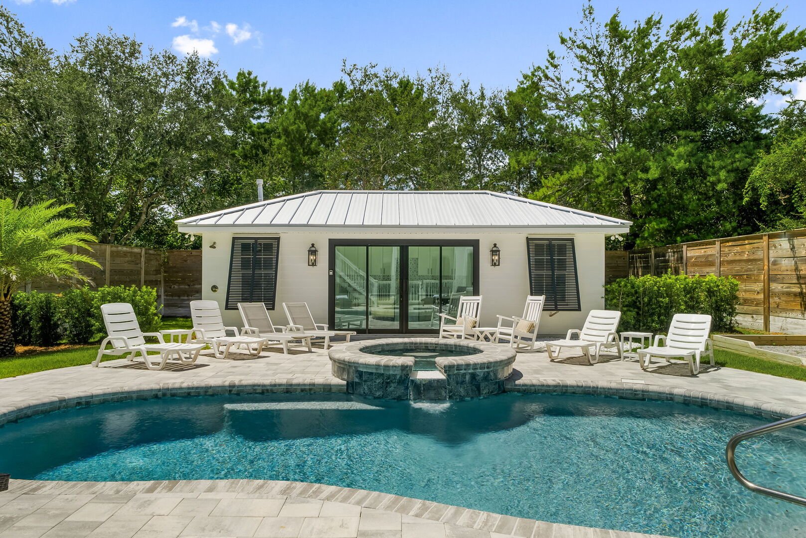 Pool house with direct access to outdoor lounging.