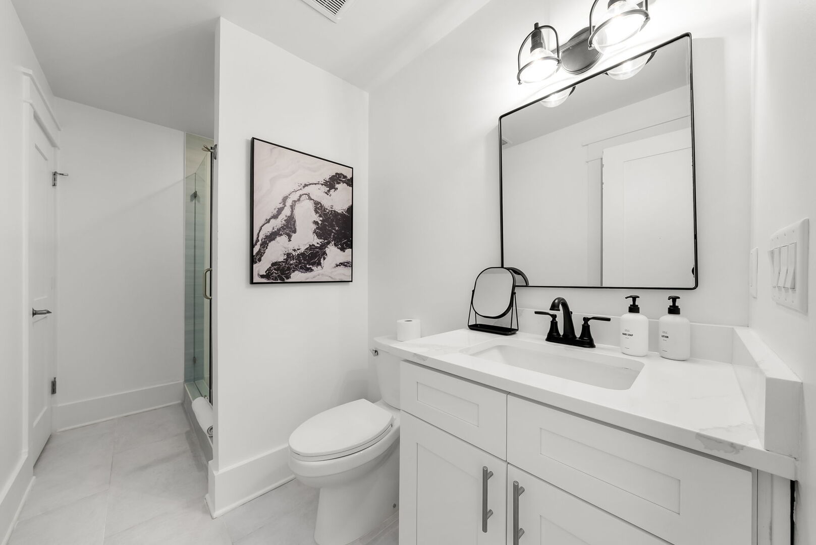 Bathroom features walk-in shower.