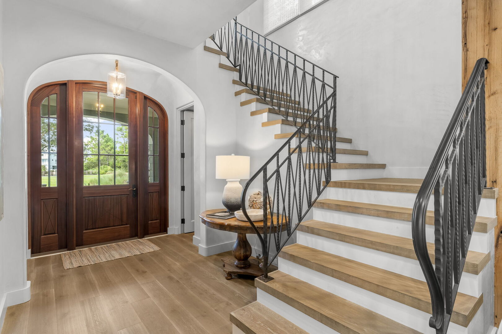 First walking in through front door there is a foyer with steps to second floor bedrooms.