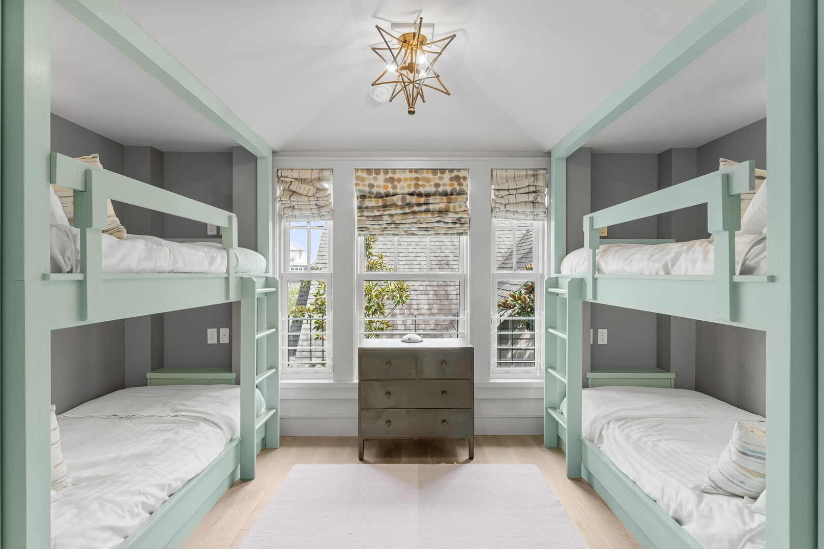 Bedroom #5 features (2) Twin-over-Twin bunks, with ensuite and smart tv.