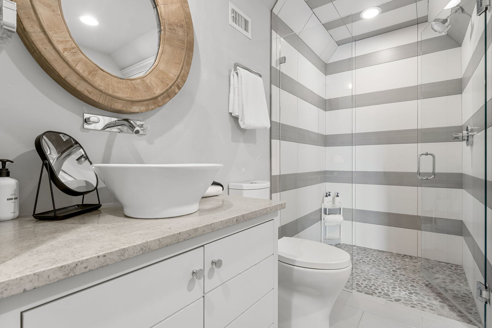 Bathroom features walk-in shower.