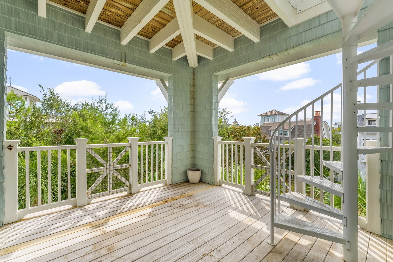 Top floor of tower access with wet bar.
