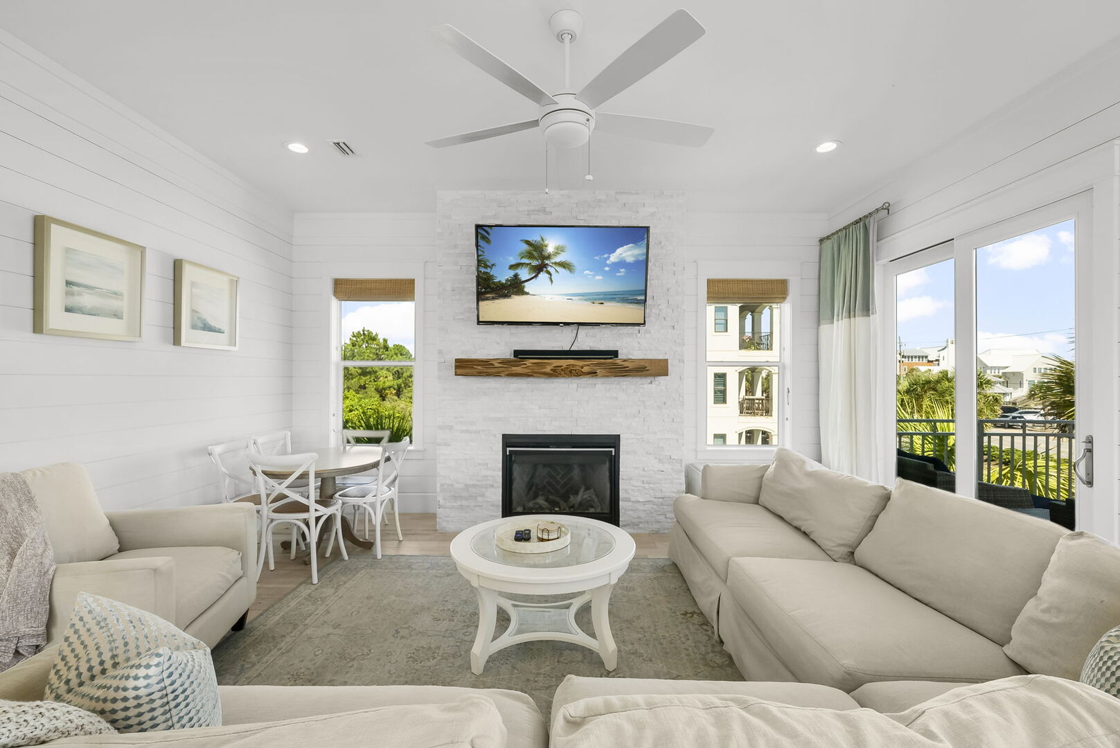 Living area offers plenty of seating and a 75