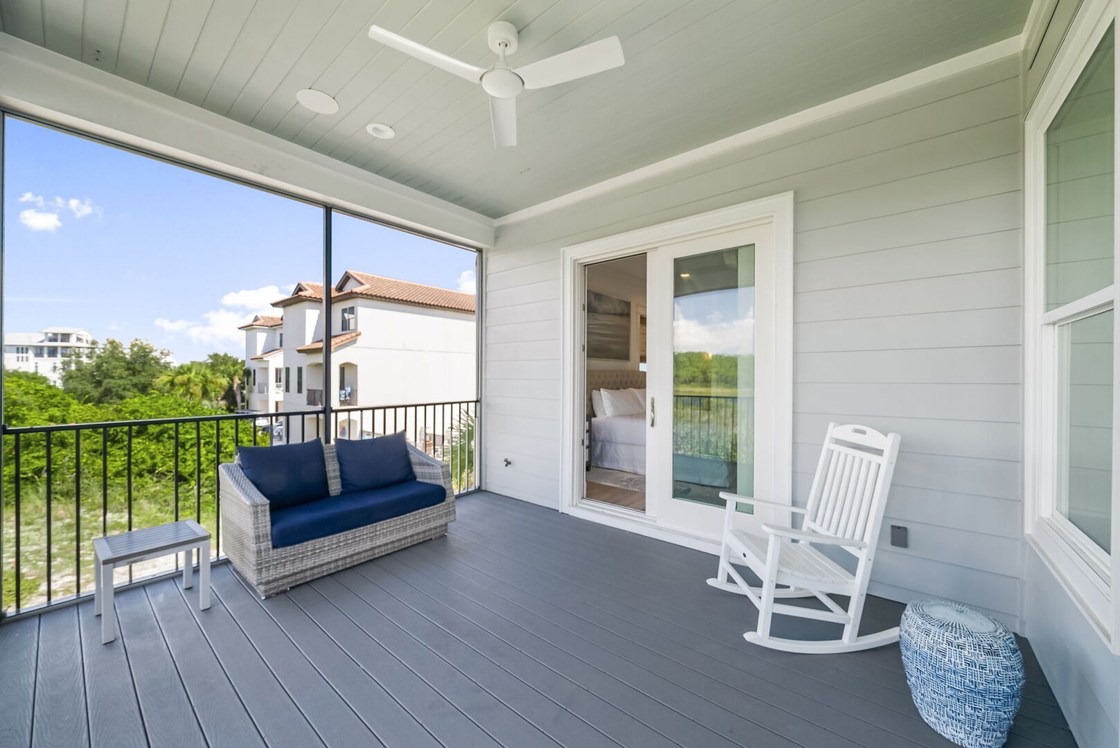 Screened in patio off bedroom.