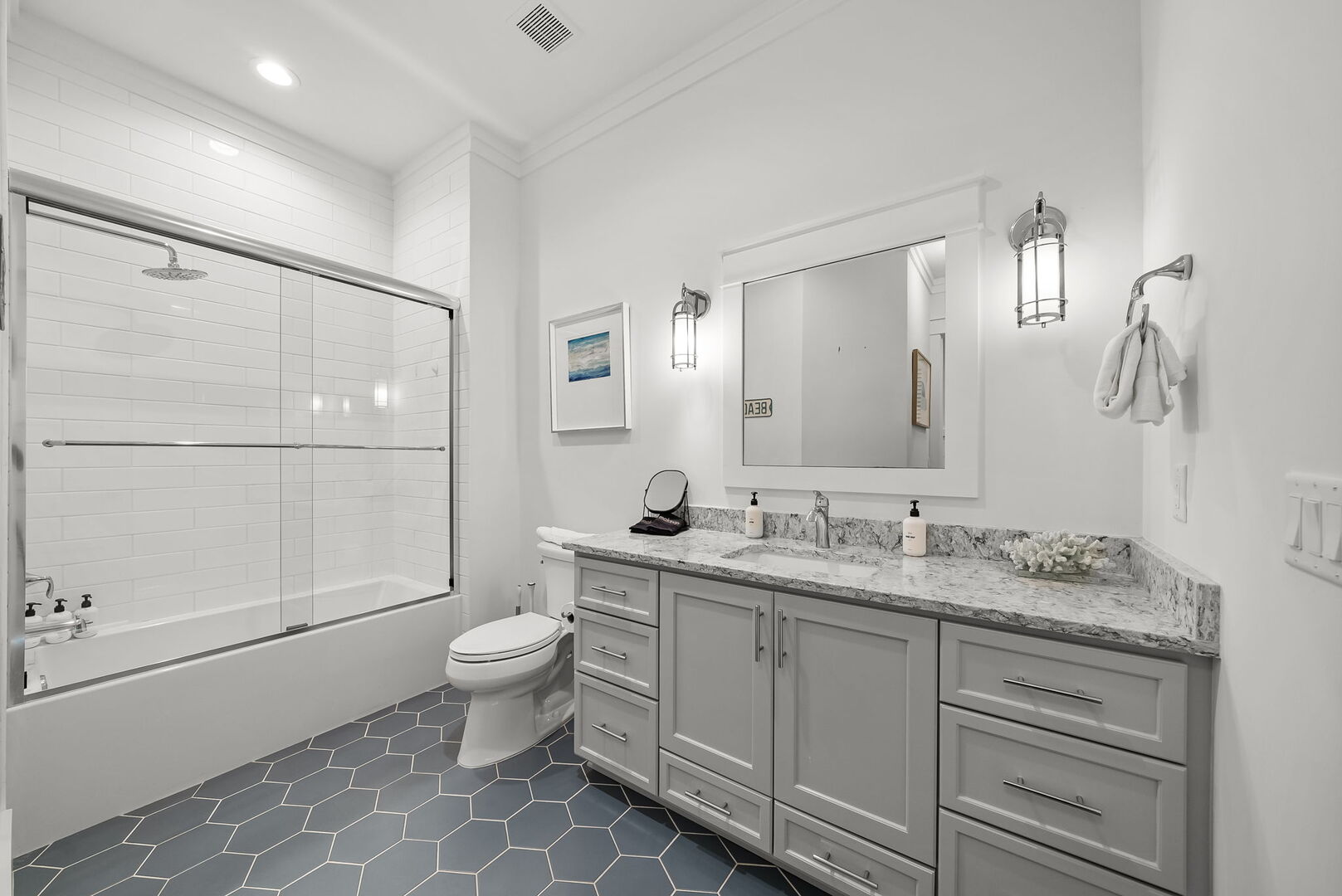 First floor bathroom features shower/tub combo.