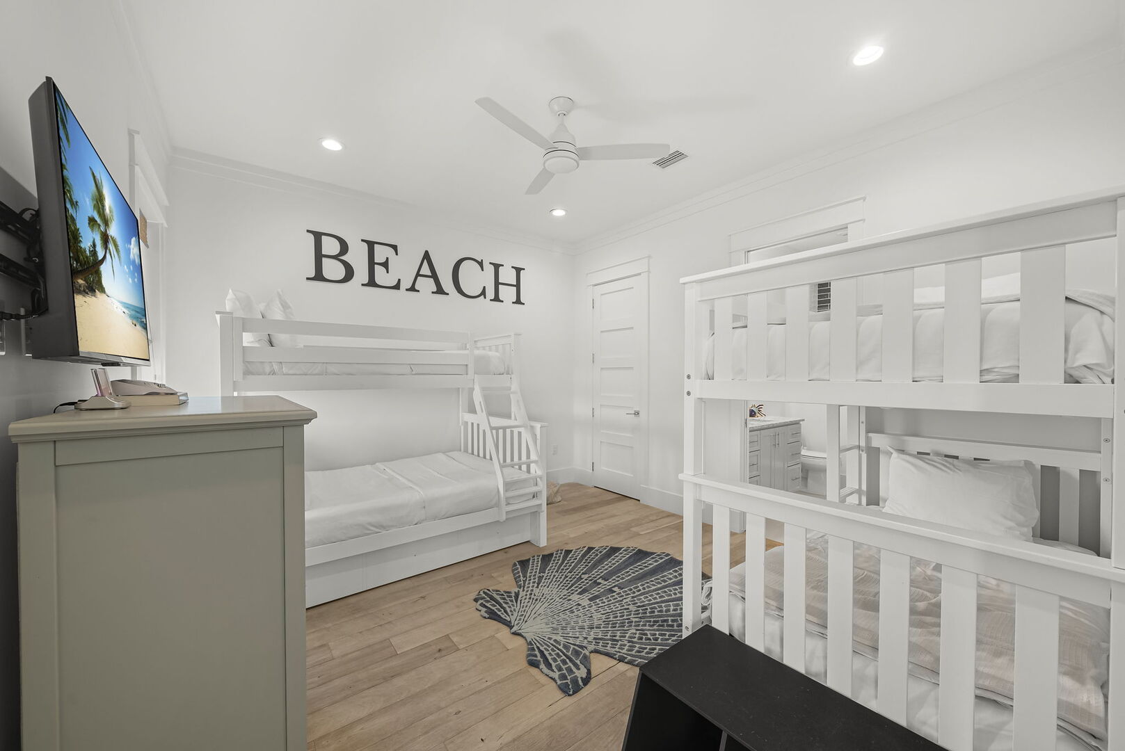 Bedroom #4 features a Twin/Twin & Twin/Full bunk bed, smart TV and ensuite.