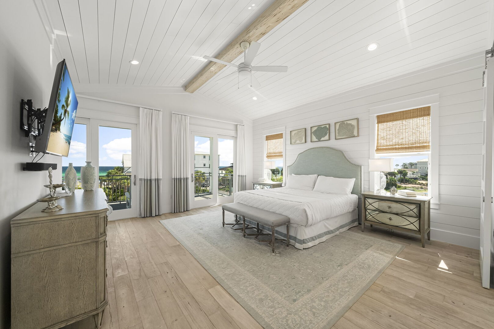 Bedroom #5 features a king bed, smart TV, ensuite & views/access to porch.