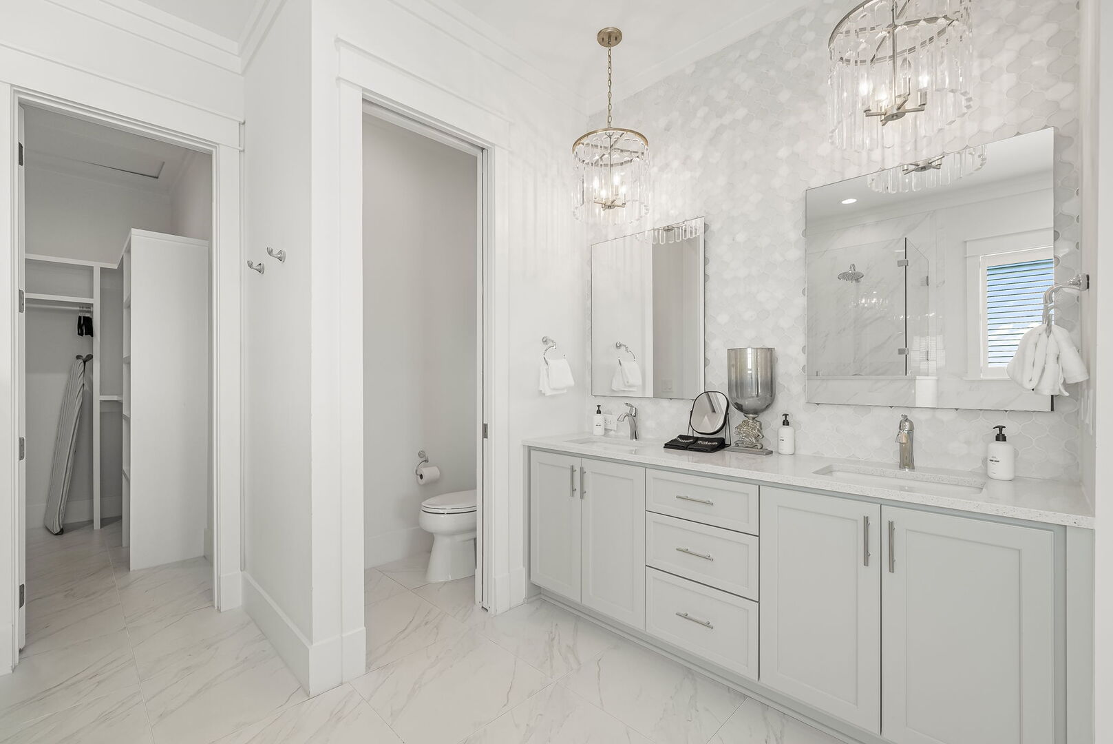 Bathroom features dual vanities.