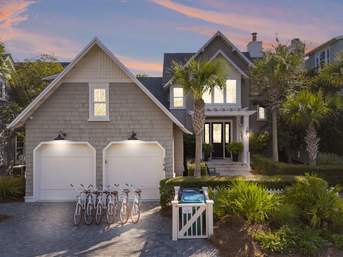 Home features 6 adult bikes and 2 driveway spaces.