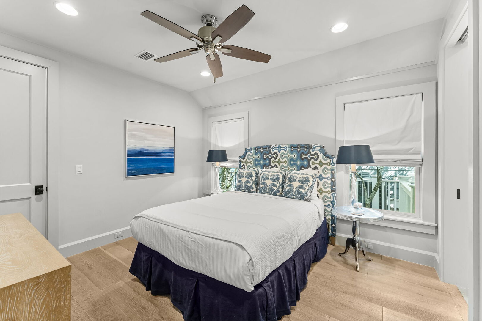 Bedroom #1 features a queen with ensuite & smart tv.