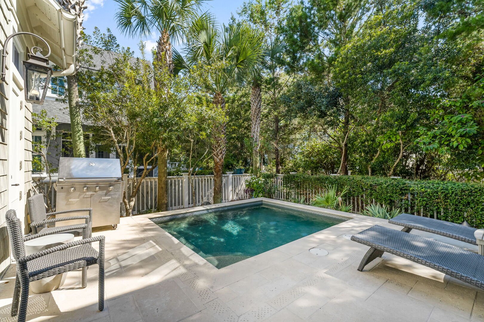 Home features a private pool with outdoor seating.