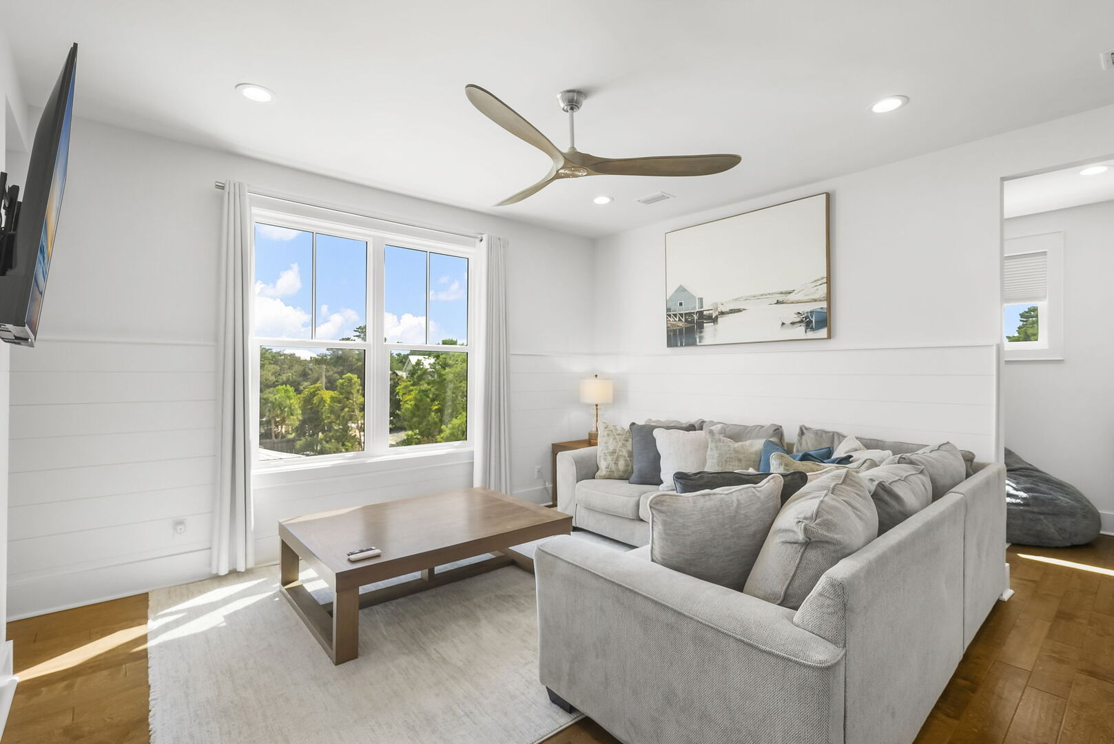 Third floor features the perfect living room & gaming space.