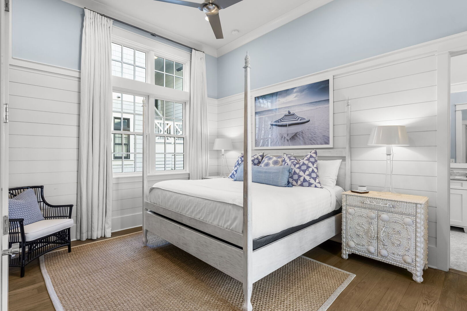 Bedroom #1 features king bed, with ensuite, access to back patio, & smart tv.