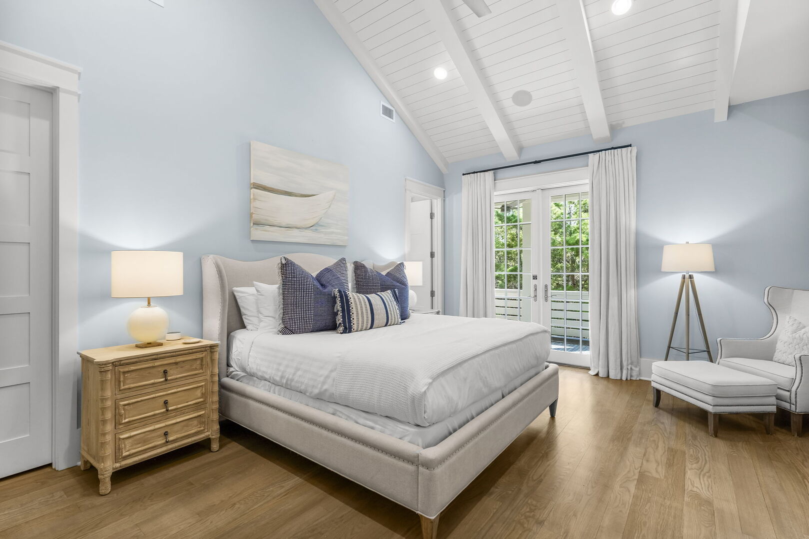 Bedroom #5 features king bed, with ensuite, access to porch, & smart tv.