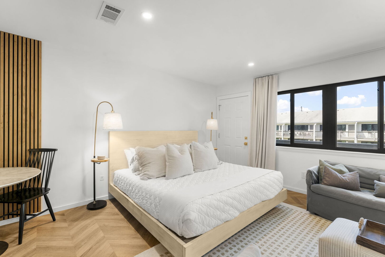 Studio features a king bed.