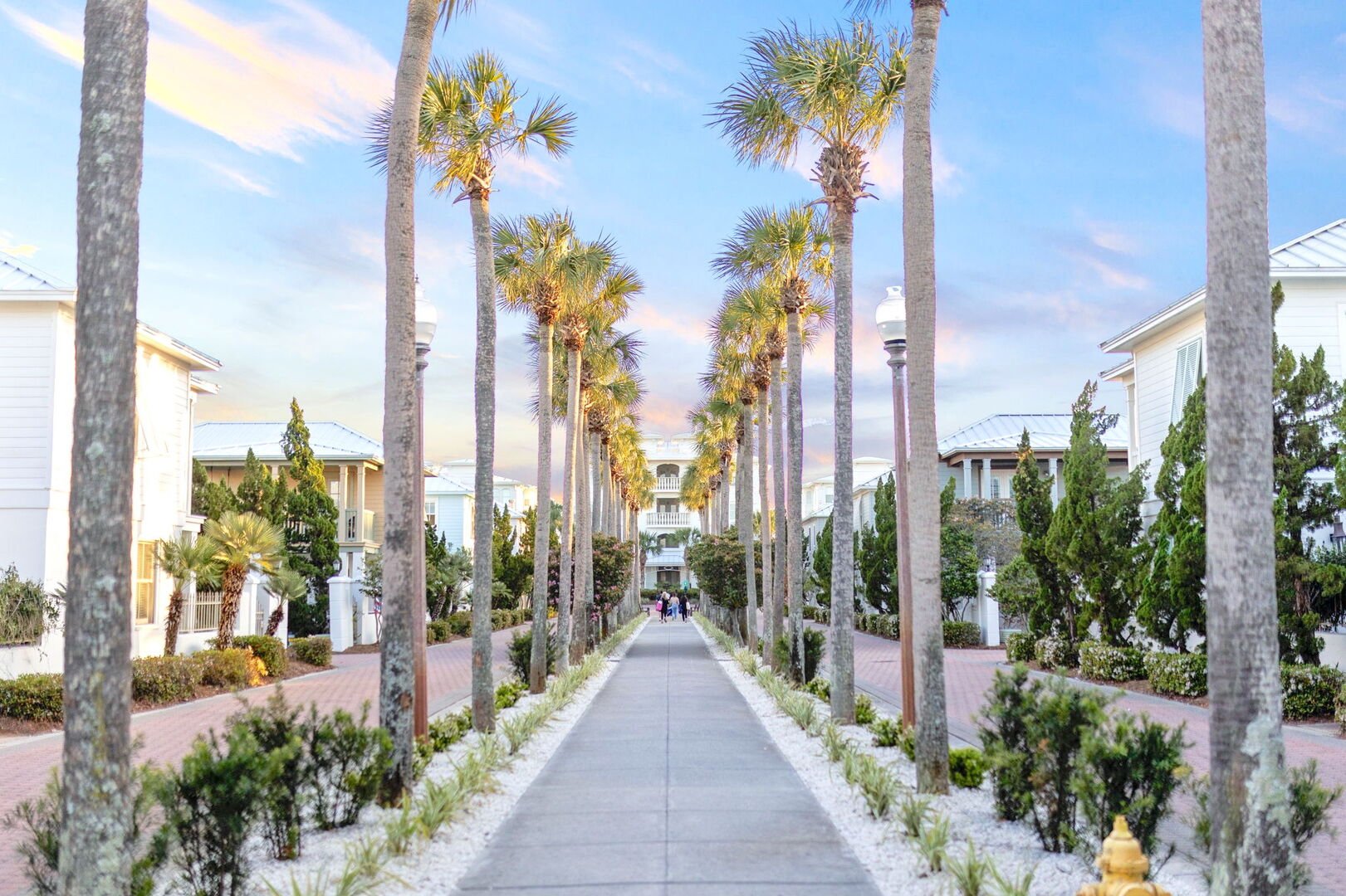 Follow the palm tree lined walkway to the emerald waters of 30A.