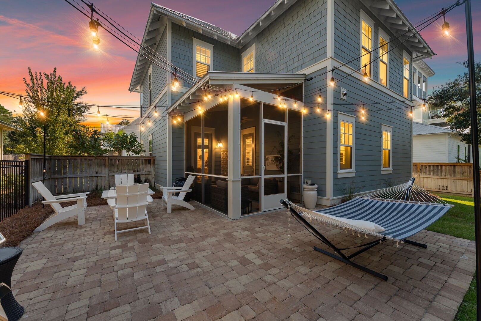 Enjoy nights in the private backyard after a long day at the beach!