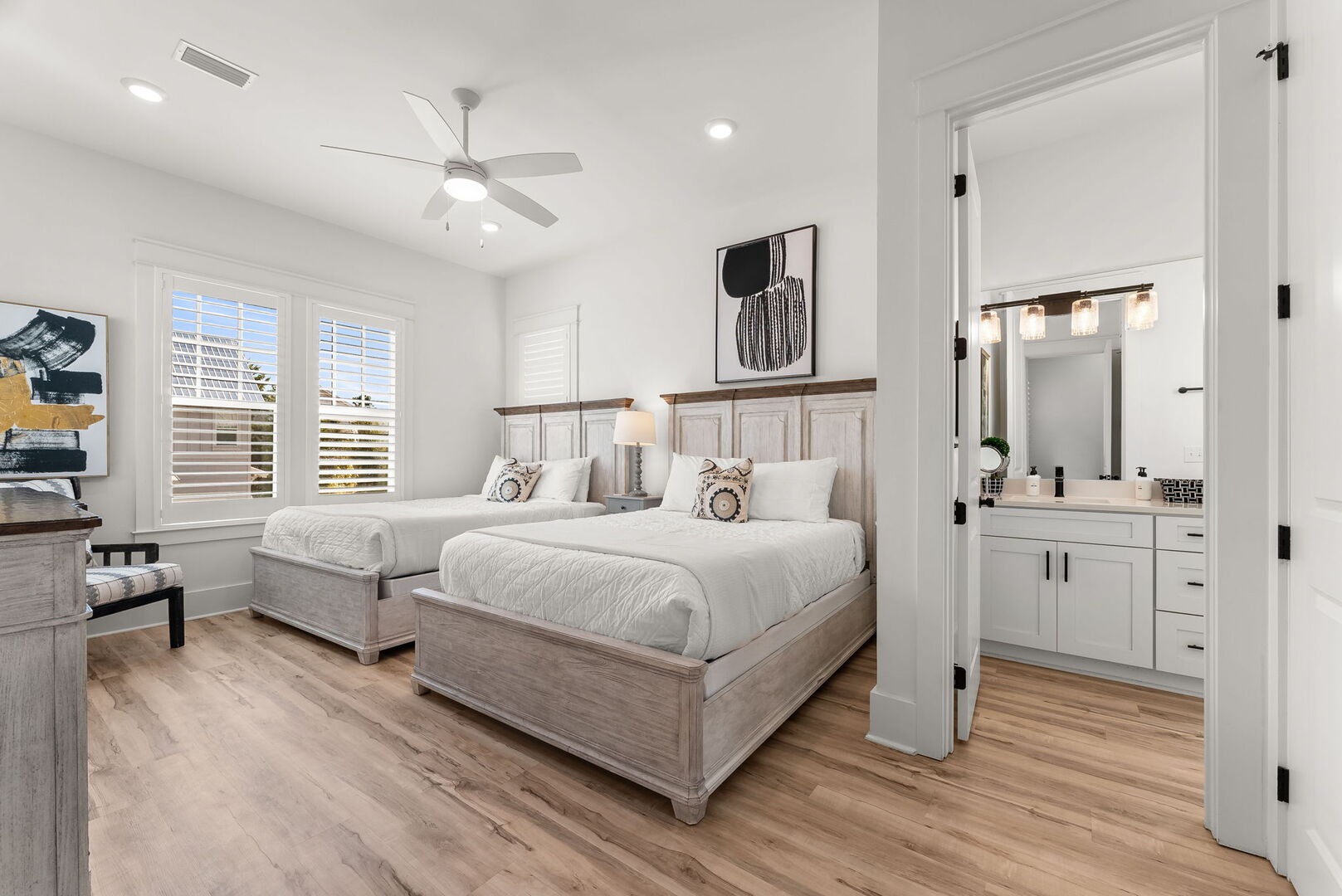 Bedroom #4 features (2) queen beds, with ensuite & smart tv.