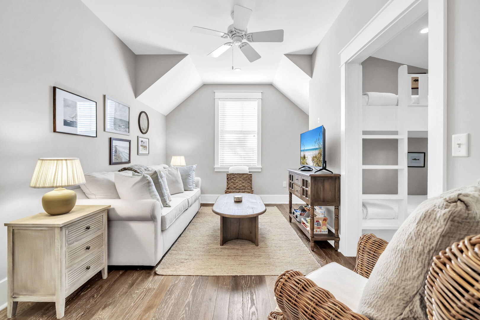 Bedroom #3 features (2) twin/twin bunks, a queen sleeper sofa, smart tv and ensuite.