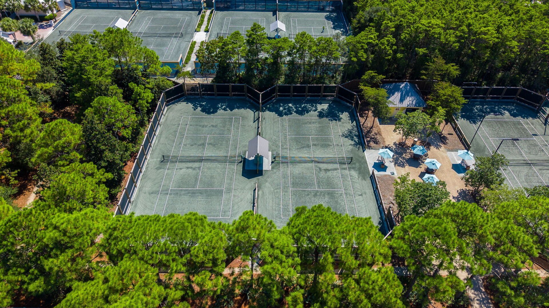 The WaterColor Tennis Center boasts five Har-Tru clay courts and two pickleball courts.