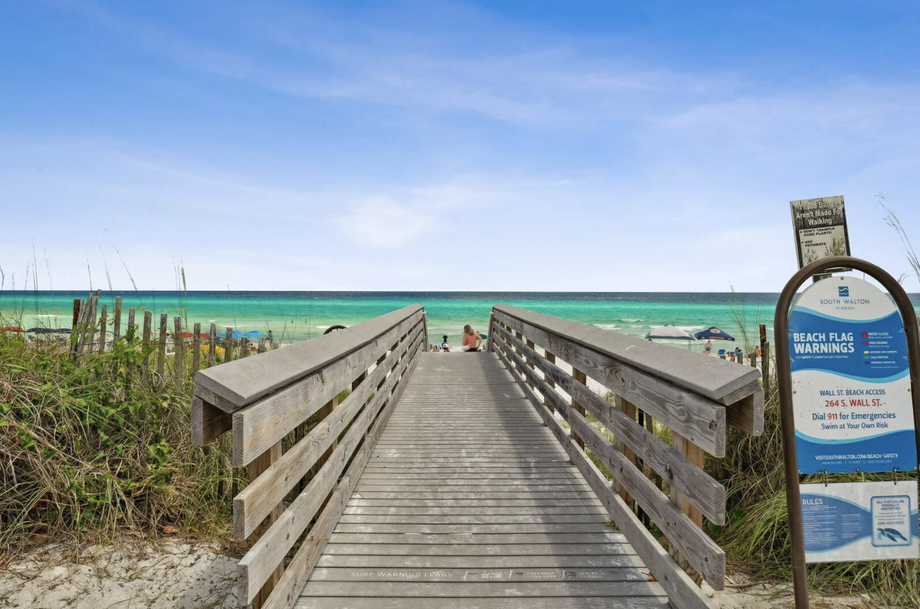 The emerald green water of 30A is just a quick walk from the home!
